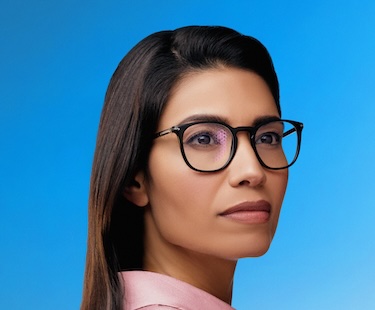 A man with Essilor/Varilux glasses